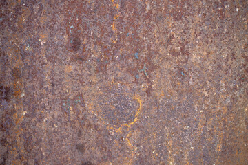 Photo of a background texture made of rusty metal. Corrosion of metal. Rusty background for text.