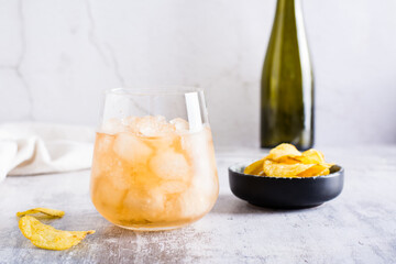 Beer slush in a glass on the table. Frozen summer drink