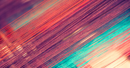 Multicolored straight strands texture background, sewing equipment, loom equipment at a garment...