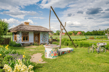 Hand decorated countryside house located in village Zalipie, Poland - 519011755