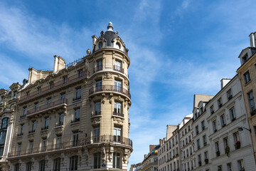 Fototapeta na wymiar Paris, typical facade and windows, beautiful building rue Reaumur 