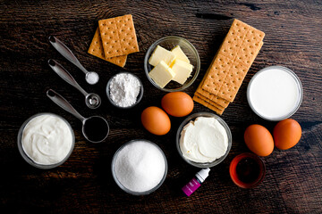Honey Lavender Cheesecake Ingredients Viewed from Above: Cream cheese, graham crackers, and other ingredients to make a dessert recipe