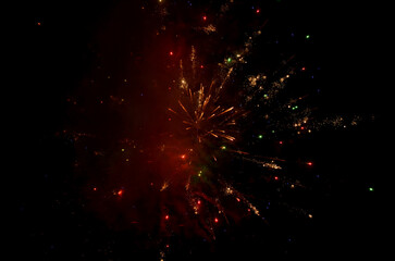 Fototapeta na wymiar Fireworks lights in the night sky