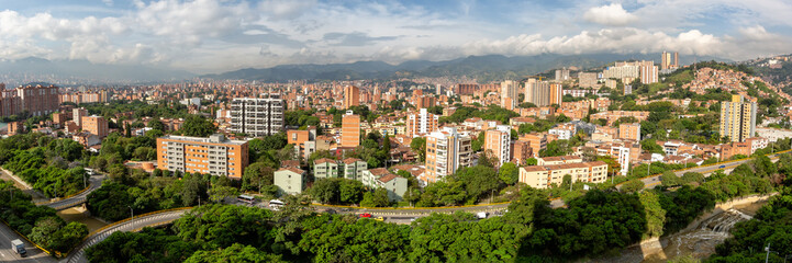 Fototapeta na wymiar Medellin town city panorama travel view on Robledo and Los Colores districts in Colombia