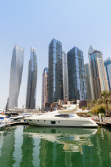 Dubai Marina skyline yacht harbor architecture travel portrait format in United Arab Emirates