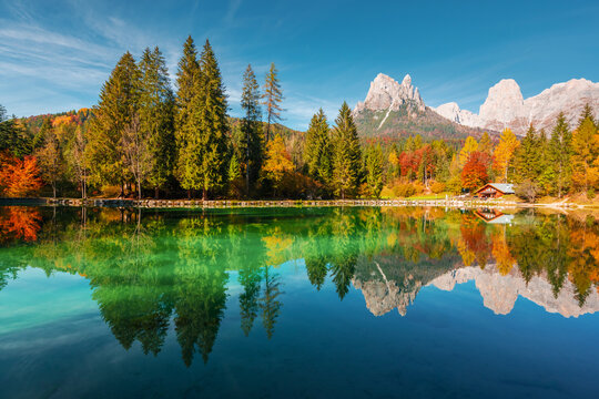 Picturesque view at autumn Welsperg lake in Dolomite Alps. Canali Valley, Primiero San Martino di Castrozza, Province of Trento, Italy. Landscape photography