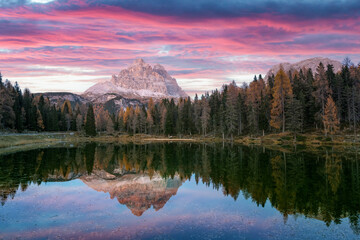 Picturesque landscape with famous lake Antorno (Lago di Antorno) in autumn Dolomites mountains. Incredible sunset in Italy Dolomites. Landscape photography