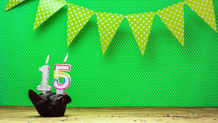 happy birthday with decorations festive garlands with muffin on a green background with polka dots....