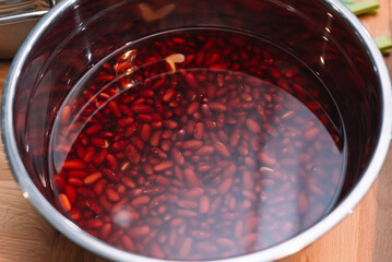 red beans soaked in water before cooking. healthy legume food, kidney beans.