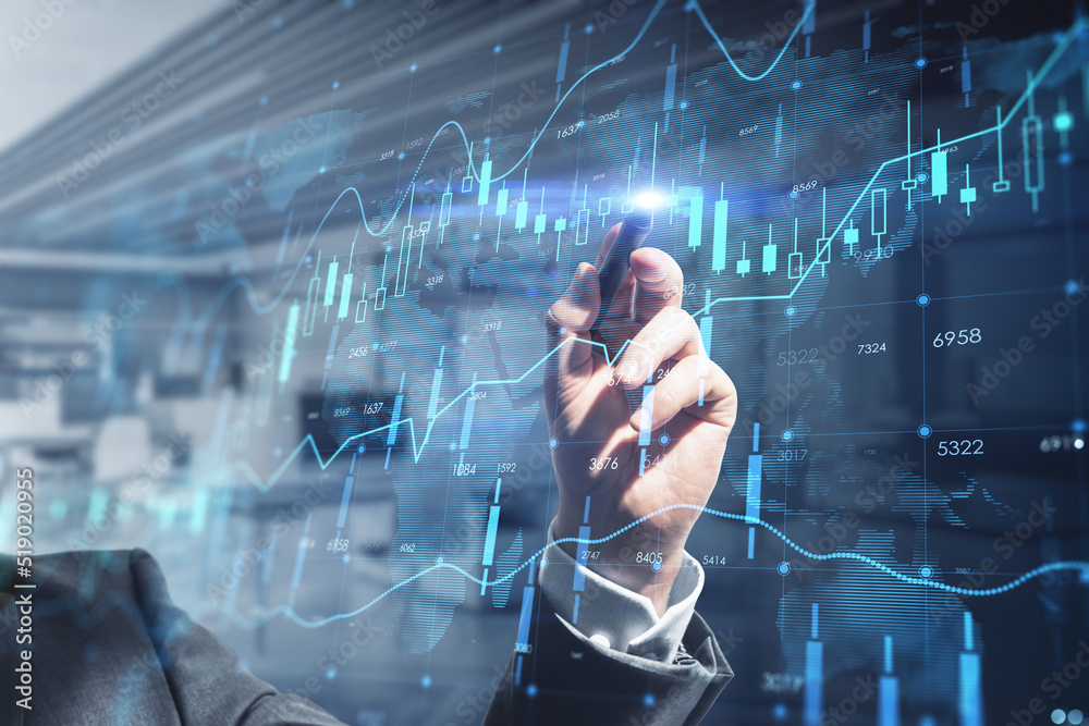Poster close up of businessman hand with pen pointing at creative glowing forex chart hologram with map on 