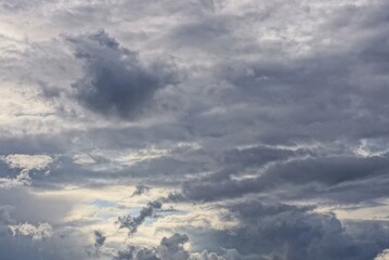 gray black clouds in the evening dark sky in bad weather