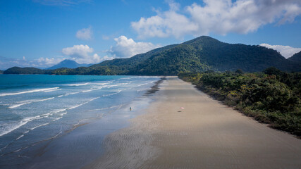 Praia da Fazenda is a tourist destination within the Serra do Mar State Park in São Paulo, Brazil. The nature of the Atlantic Forest and the beach with clear blue-green waters enchant the tourists.