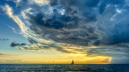 Sunset Sailboat Storm Looming Ocean Clouds