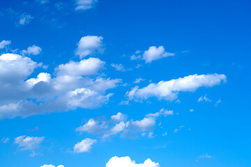 Sunny blue sky with clouds. Clouds move smoothly across the sky