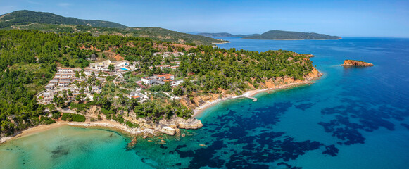 Naklejka premium Aerial view over Chrisi Milia beach and the rocky surrounded area in Alonissos island, Greece