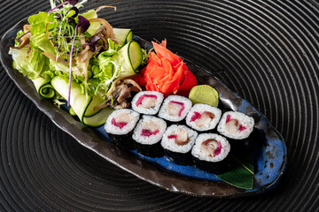 sushi set with fresh salad