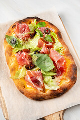 italian pizza on the wooden board