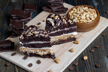 chocolate cake with nut filling and peanuts