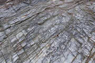 Rough rugged, scratch and crack of stone or rock surface. 