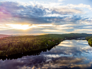 Fototapeta premium Sunset by the lake from the air