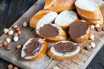 chocolate butter spread on a baguette, close up