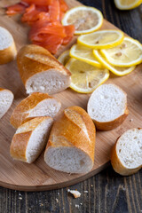 cutting fish fillets during the preparation of a dish of red salmon fish