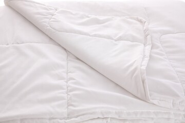 Clean soft white blanket as background, closeup