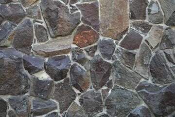 Stone surface as background, closeup. Seamless texture