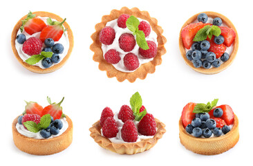 Set of tasty sweet tartlets with fresh berries on white background