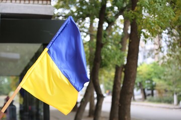 National flag of Ukraine on city street