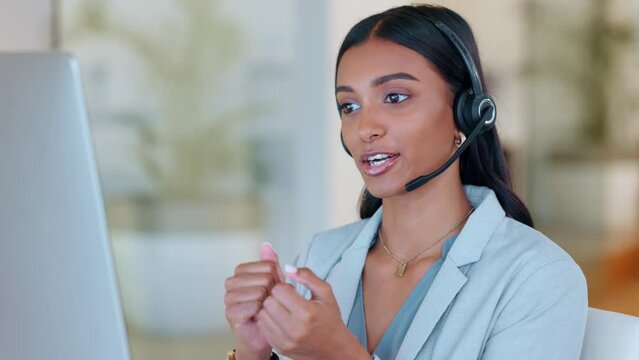 Woman sales consultant talking with a headset microphone at a call center. Happy ecommerce support agent with business communication skills discussing company services or online queries to clients