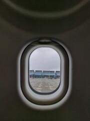 Fototapeta na wymiar airplane window in flight