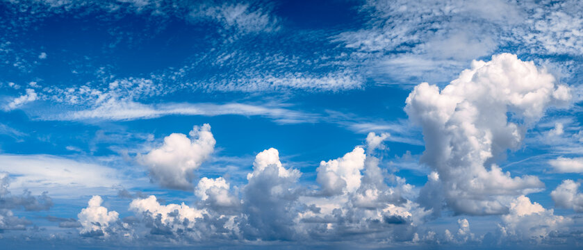 panoramic view of Clouds in blue sky © Matthew Tighe
