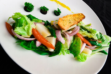 fresh green vegetable  salad with lemon sauces