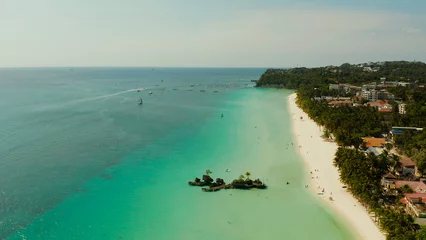 Acrylic prints Boracay White Beach White sand beach and Willy's rock with tourists and hotels and sailing boat on Boracay Island. Aerial drone: Tropical white beach with sailing boat. Summer and travel vacation concept.