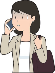 電話で青ざめる女性ビジネスマン