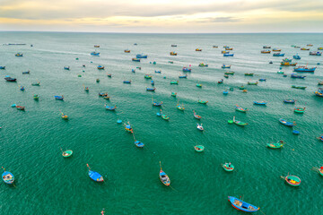 Mui Ne fishing village seen from above with hundreds of boats anchored to avoid storms, this is a beautiful bay in central Vietnam