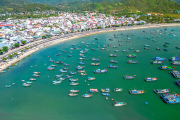 Vinh Luong fishing village, Nha Trang, Vietnam seen from above with hundreds of boats anchored to avoid storms, traffic and densely populated areas below