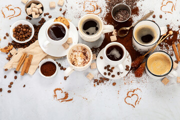 Coffee cup assortment on light background.