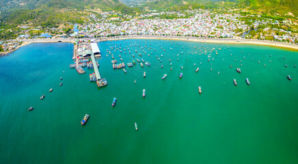 Vinh Luong fishing village, Nha Trang, Vietnam seen from above with hundreds of boats anchored to avoid storms, traffic and densely populated areas below