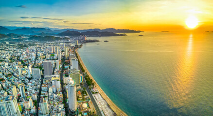 The coastal city of Nha Trang seen from above on at dawn. This is a famous city for cultural tourism in central Vietnam © huythoai