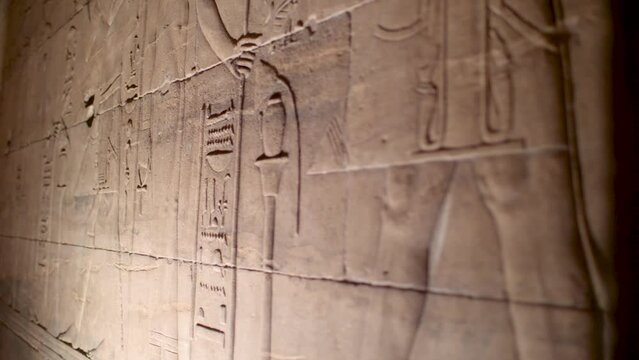 Details of hieroglyphs on the walls inside the temple of Philae, Aswan, Egypt.