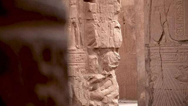 Detail of ancient hieroglyphs on a wall in an ancient temple in Kom Ombo, Egypt.