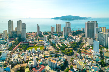 The coastal city of Nha Trang seen from above on a sunny summer afternoon. This is a famous city for cultural tourism in central Vietnam