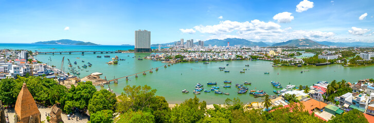 The coastal city of Nha Trang seen from above on a sunny summer afternoon. This is a famous city...