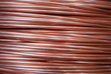 Closeup view coils of rolled copper wire.