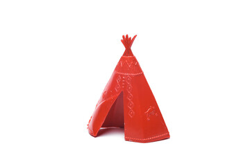 Red plastic toy Native American wigwam isolated on white background © splitov27