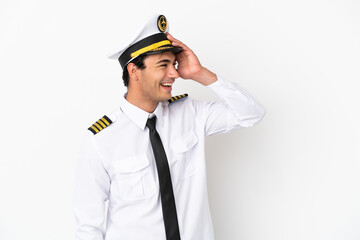 Airplane pilot over isolated white background has realized something and intending the solution