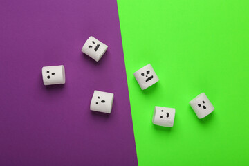 Top view, flat lay halloween layout marshmallows with faces on purple green background. Trick or Treat