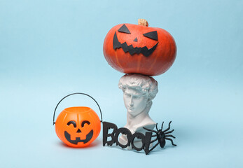 David bust with halloween decoration on blue background